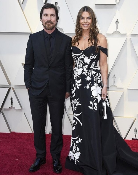 Christian Bale in Brioni, Sibi Bale in Carolina Herrera