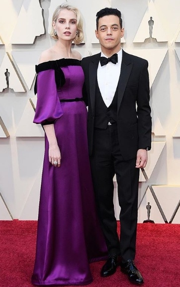 Rami Malek in ysl, Lucy Boynton in Rodarte